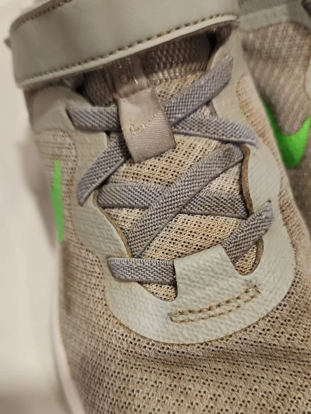 Nike Kids Gray Sneakers with Green Swoosh